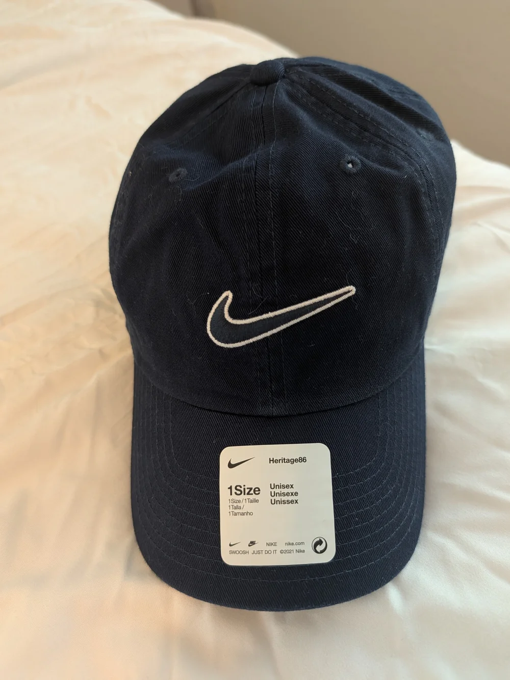 Nike Navy Baseball Cap with White Swoosh - Unisex
